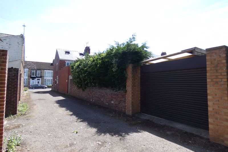Side access to Garage door/off street parking- click for photo gallery